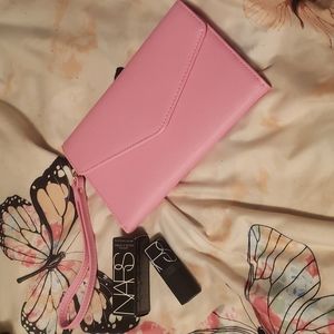 Pink wallet and lipstick